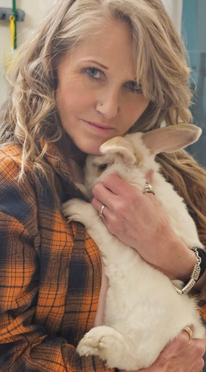 Jolene Federico holding a white rabbit